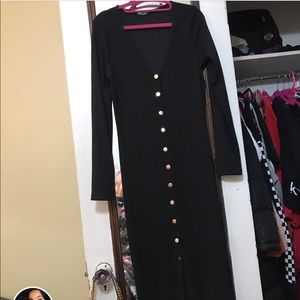 Black dress with gold buttons